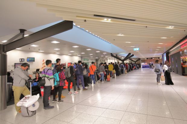 Queue at Melbourne airport immigration visa australia