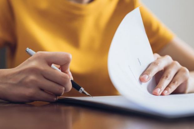 Signing insurance papers