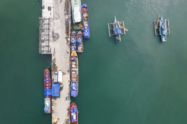 Aerial of the wharf and seaport of the town of Sual