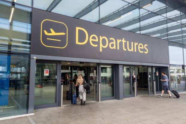 The sign for the departure hall of Gatwick Airport north terminal building