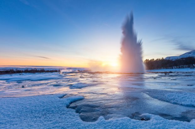 Water breaking frozen surface