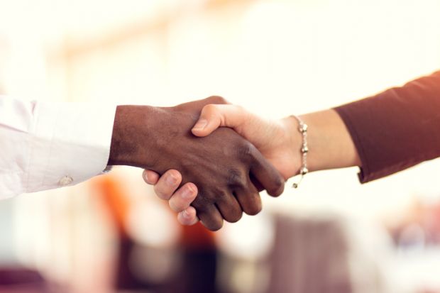 Shaking hands with your PhD supervisor. We provide tips from experts on how to approach and make a good impression with a potential PhD supervisor.