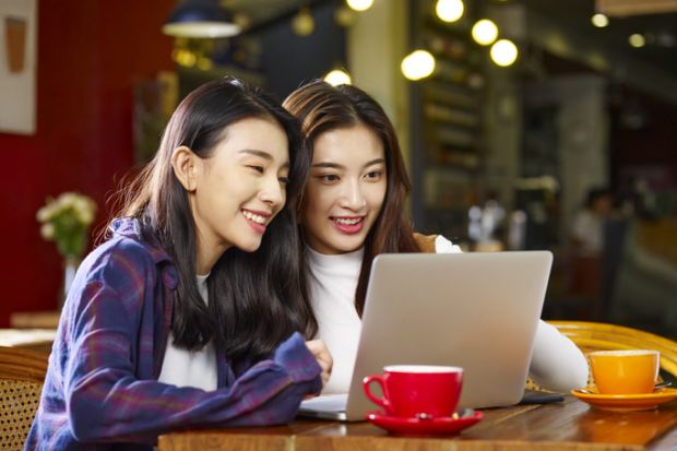 Students using laptop