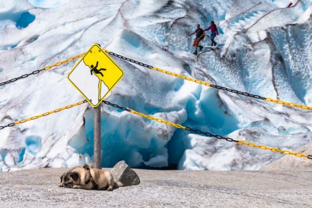 Danger sign near Nigardsbreen glacier. Jostedal, Norway