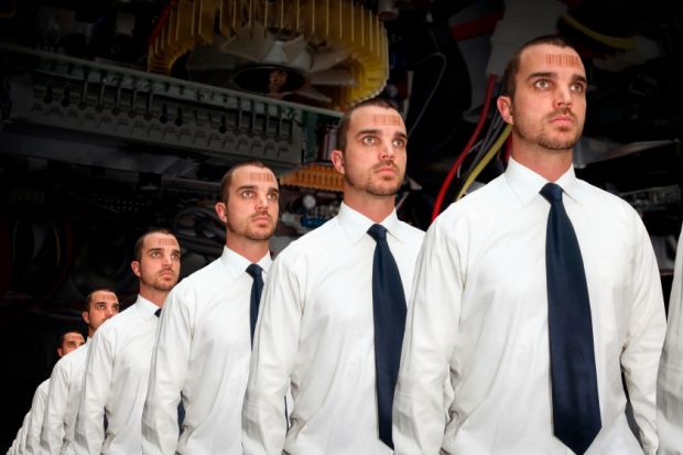 Identical men with bar codes on a production line