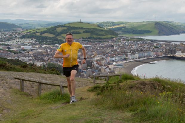 John Grattan running Ironman