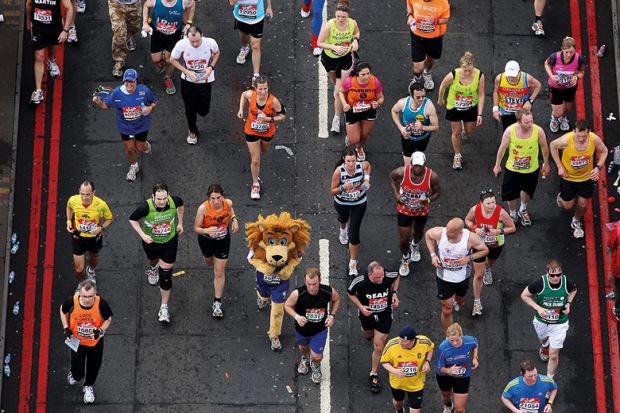 Runner in lion fancy-dress