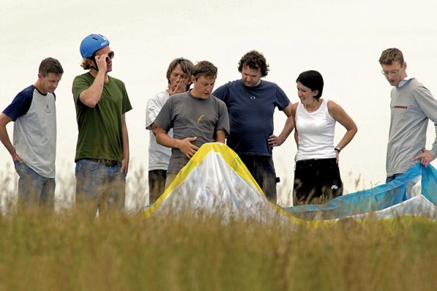 People learning to paraglide