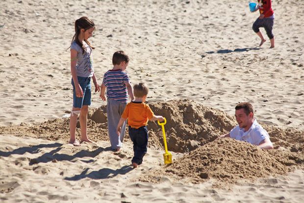 Digging a hole on the beach