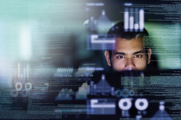 Man working with data on screen