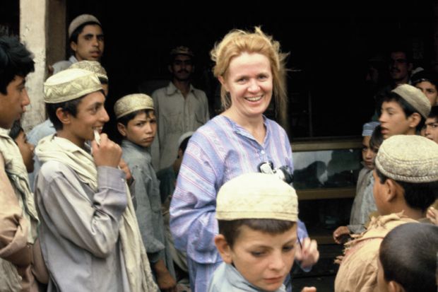 Mary Guinan with group of young children