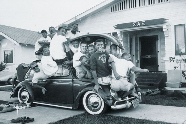 men in car