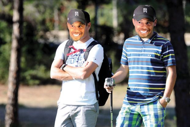 Men wearing Tiger Woods masks, Turkish Airlines Open Golf Tournament, 2013