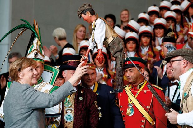 Merkel meets a puppet