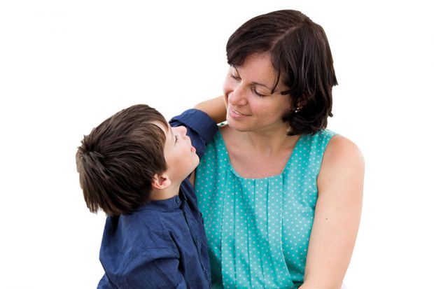 Mother speaking to young son