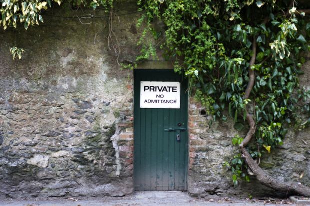 A door with a "no admittance" sign