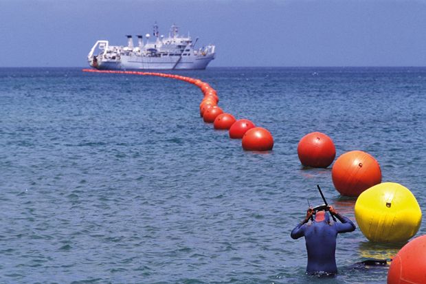 Buoys and ship at sea