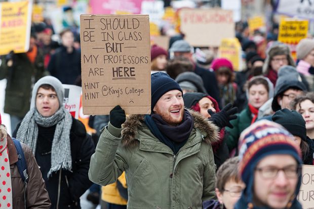 A protester holding a placard