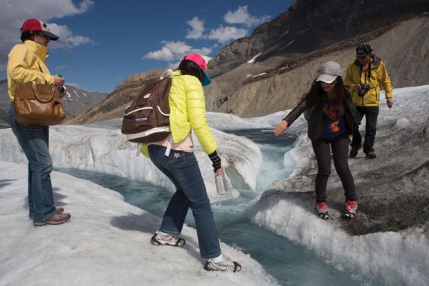 People on glacier walk, Jasper National Park, Alberta, Canada