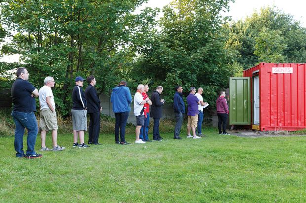 People queuing for toilet