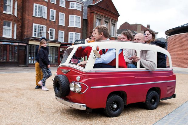 People squeezed into tiny van