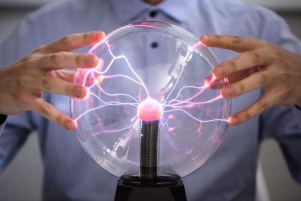 Hands on a plasma globe