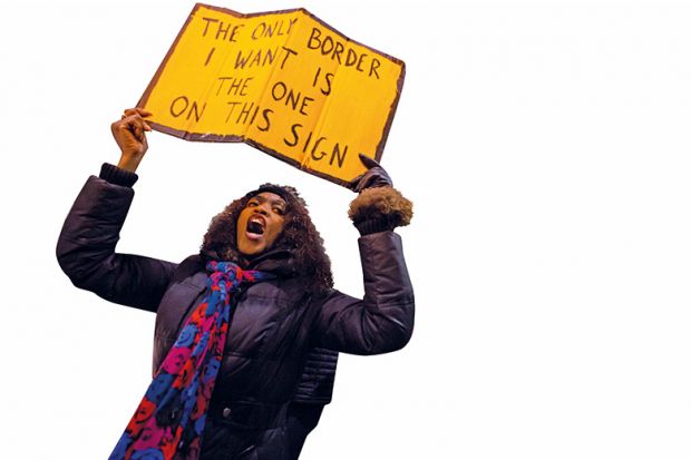 Protester with sign