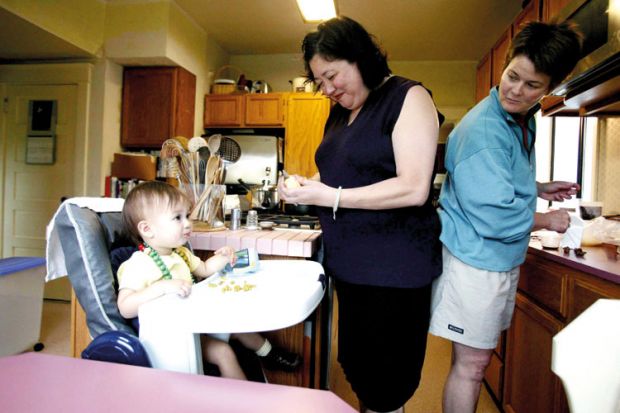 Rebecca Kennedy and Mary Li with daughter