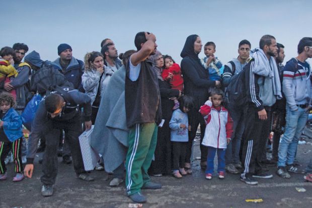 Refugees cross into Hungary from Serbia