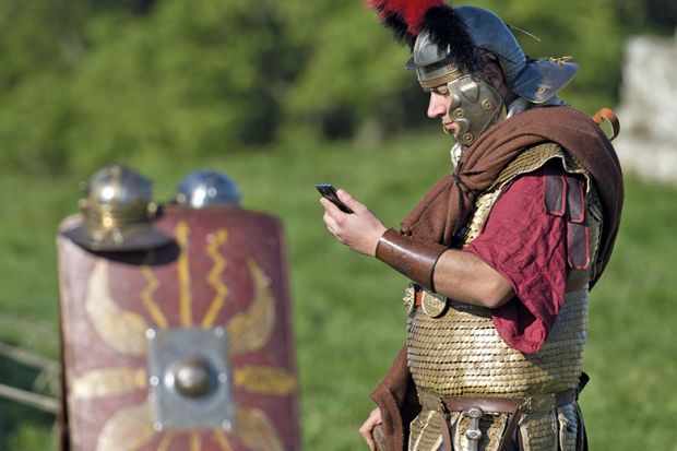 Roman centurion with mobile phone