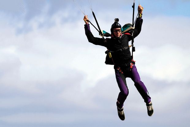 skidiver landing afterjumping from a plane