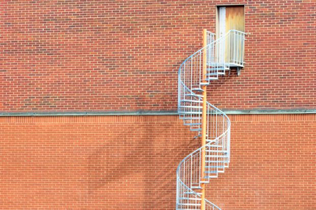 Spiral staircase by an exit door