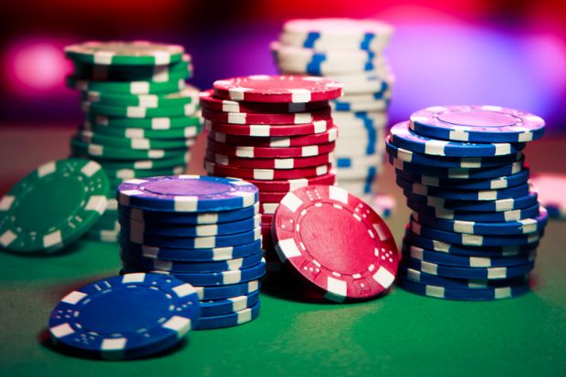 Stacks of casino chips on table