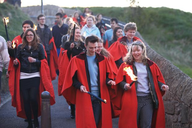 Students gathered at St Andrews Castle