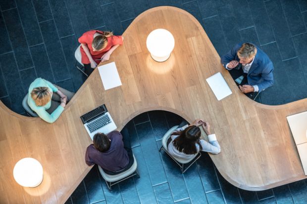 A team of people working together at a university