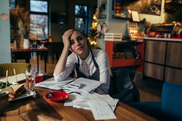 A tired student waitress