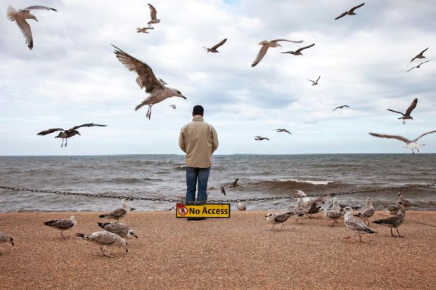 Single person looking out to see to illustrate Scholars in limbo as UK quits European University Institute