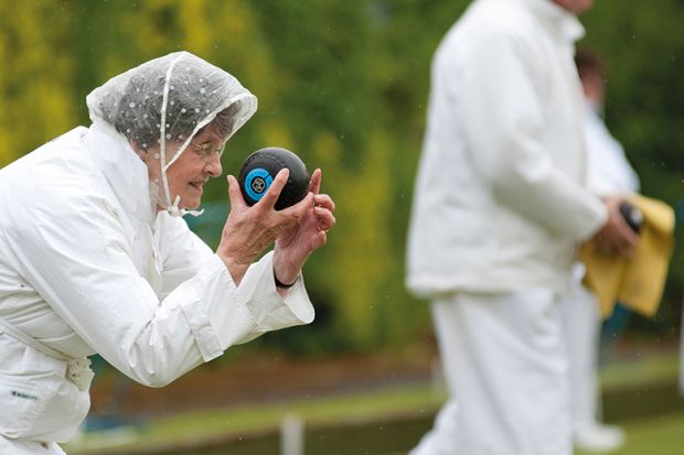 woman bowls rain