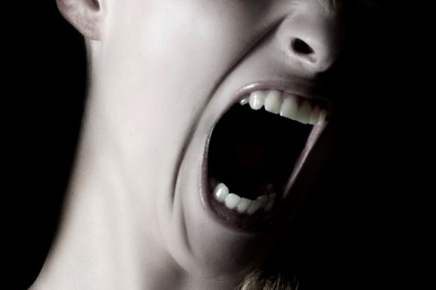 Woman screaming (close-up)