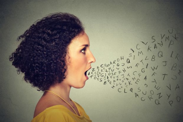 Woman talking with alphabet letters coming out of mouth