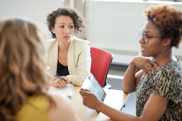 women-meeting-at-table