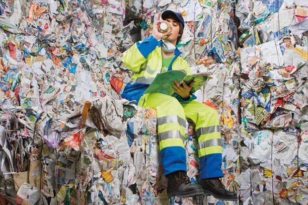 worker-surrounded-by-paper