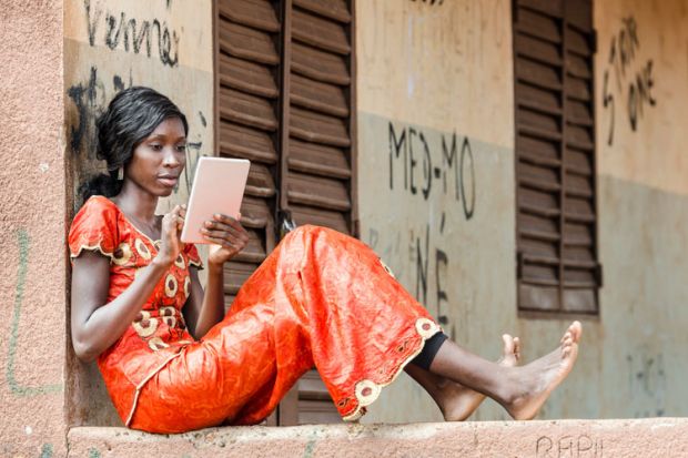 Young woman using tablet PC